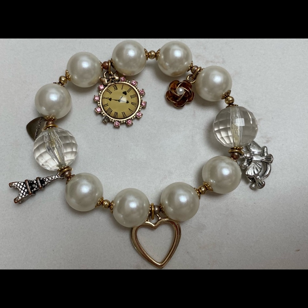 Betsey Johnson Pearls and Charms Bracelet.